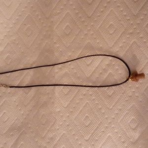 Crystal mushroom pendant on black cord